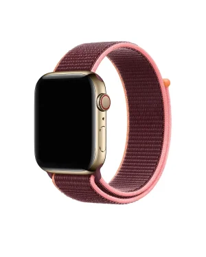 Gold Apple Watch with plum and pink sport loop band